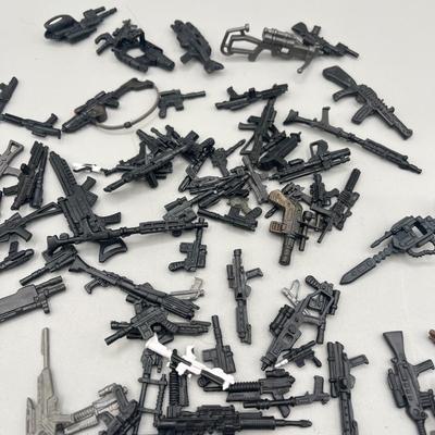 LOT 214: Star Wars Accessory Collection - 1990s Figures - Guns, Light Sabers, Clothes, Wepons and More