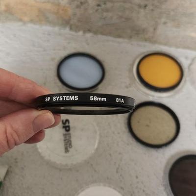 Sale Photo Thumbnail #903: Lot of 8 - 58 mm filters. Fits small flat rate box
