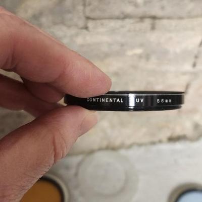 Sale Photo Thumbnail #910: Lot of 8 - 58 mm filters. Fits small flat rate box