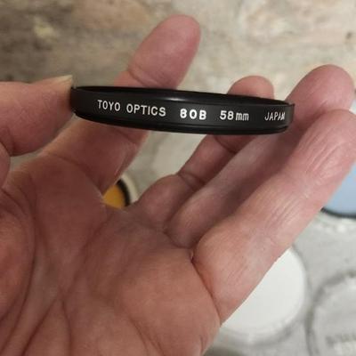 Sale Photo Thumbnail #908: Lot of 8 - 58 mm filters. Fits small flat rate box