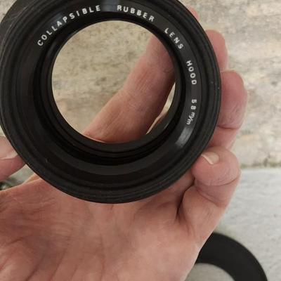 Sale Photo Thumbnail #916: 62mm rubber hood and skylight filter. Fits small flat rate box