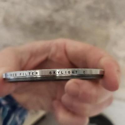 Sale Photo Thumbnail #914: 62mm rubber hood and skylight filter. Fits small flat rate box