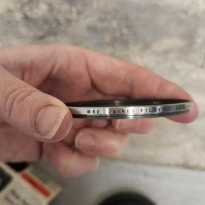 Sale Photo Thumbnail #913: 62mm rubber hood and skylight filter. Fits small flat rate box