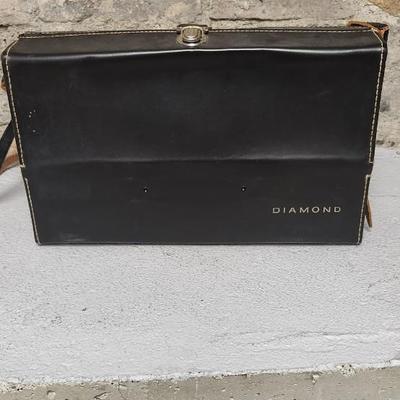 Sale Photo Thumbnail #955: Excellent condition. Polaroid 101, case, cold meter thingie, flashbulbs, book