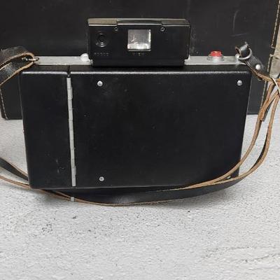 Sale Photo Thumbnail #962: Polaroid Automatic 100 with case and accessories.