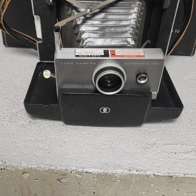 Sale Photo Thumbnail #960: Polaroid Automatic 100 with case and accessories.
