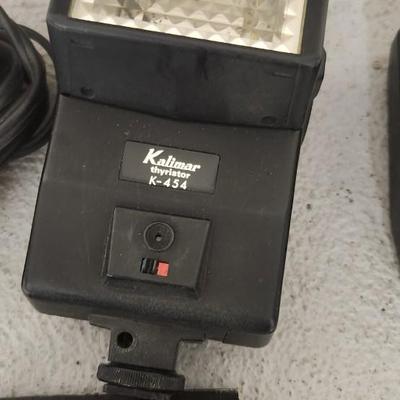 Sale Photo Thumbnail #1015: Set of 4 electronic flash units. One speed light cord. Fits medium flat rate box