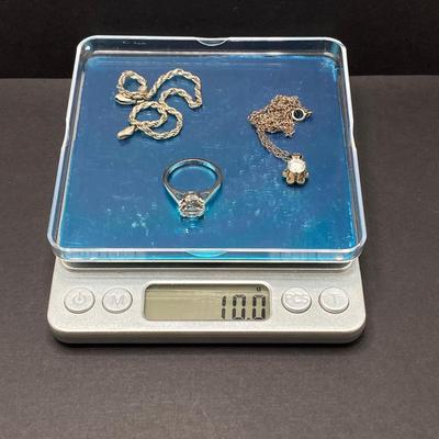 LOT 401: Sterling Jewelry - Cubic Zirconia Ring Sz 7.5, Pendant Necklace 18" and Bracelet 8"