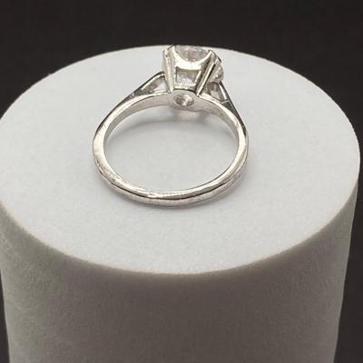 LOT 401: Sterling Jewelry - Cubic Zirconia Ring Sz 7.5, Pendant Necklace 18" and Bracelet 8"