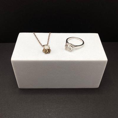 LOT 401: Sterling Jewelry - Cubic Zirconia Ring Sz 7.5, Pendant Necklace 18" and Bracelet 8"