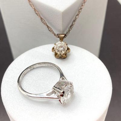 LOT 401: Sterling Jewelry - Cubic Zirconia Ring Sz 7.5, Pendant Necklace 18" and Bracelet 8"