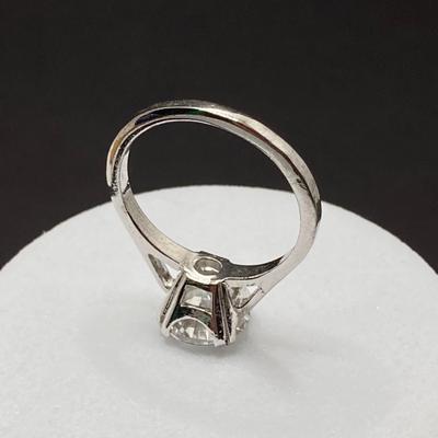 LOT 401: Sterling Jewelry - Cubic Zirconia Ring Sz 7.5, Pendant Necklace 18" and Bracelet 8"