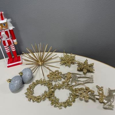 Gold ornaments and red nutcracker