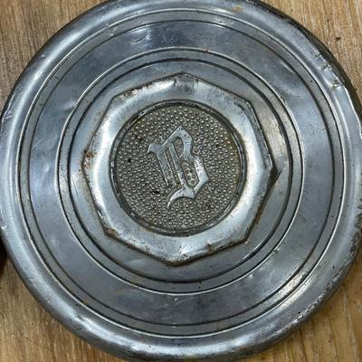 2 Buick hubcaps or wheel cover