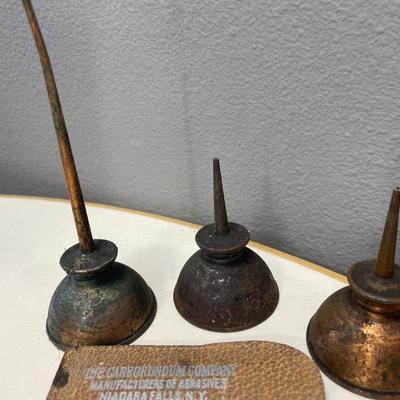 Small oil cans and abrasions