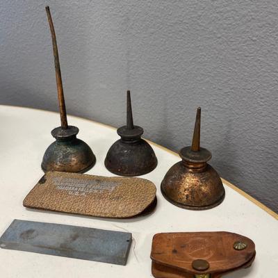 Small oil cans and abrasions