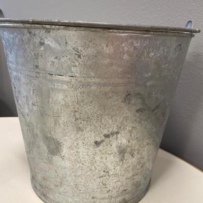 Metal pail with vintage locks