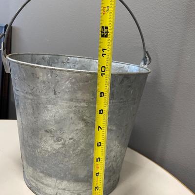 Metal pail with vintage locks