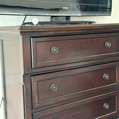 Sale Photo Thumbnail #3: Long dresser, tall dresser, headboard. and night stand all in the same dark wood finish.