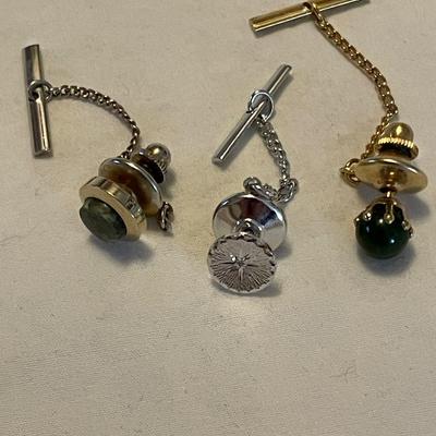 THREE TIE TACKS