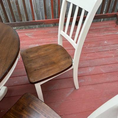 Sale Photo Thumbnail #14: 42” round dark wood dining table with matching set of 5 chairs.