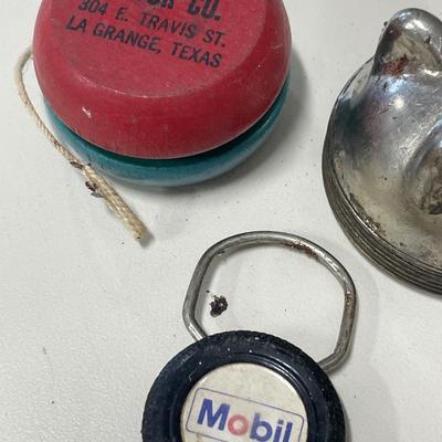 Radiator cap, yo-yo and Mobil key ring
