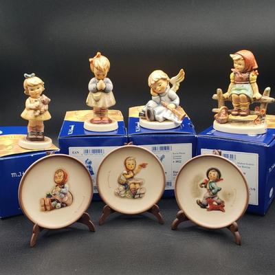 LOT 403: Assortment of Hummel Figurines and Mini Collector Plates with Original Boxes; First Issue; Goebel Germany