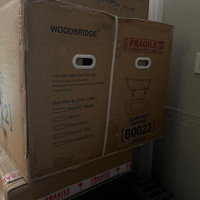 Sale Photo Thumbnail #40: Brand new in box WoodBridge 59” x 31” Clawfoot soaking acrylic bathtub. Oil rubbed bronze in color.

Drain assembly is not included.
Drain diameter - 2”
Soaking depth, top to bottom - 14.125”
48 Gallon capacity