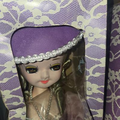 Sale Photo Thumbnail #70: Lot of porcelain and assorted dolls