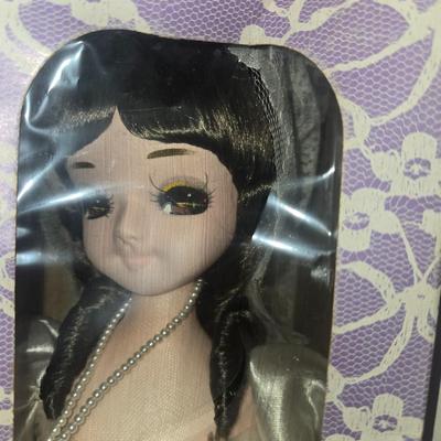 Sale Photo Thumbnail #69: Lot of porcelain and assorted dolls