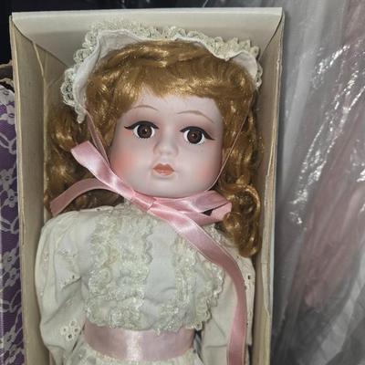 Sale Photo Thumbnail #68: Lot of porcelain and assorted dolls