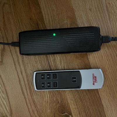 Sale Photo Thumbnail #53: Electric head and foot adjustable base.  Motor runs smooth and very responsive with the remote.