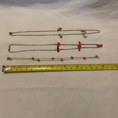 THREE CHOCKER NECKLACES