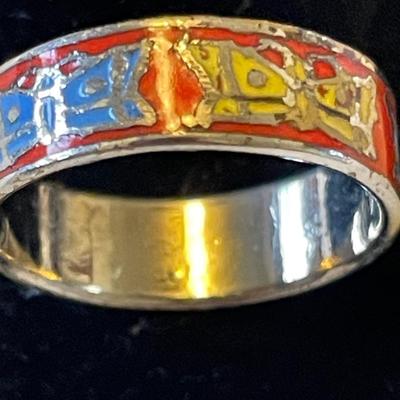 LADIES STERLING RING WITH ORANGE SPINY STONE AND AN ENAMELED BAND