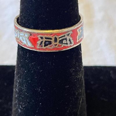 LADIES STERLING RING WITH ORANGE SPINY STONE AND AN ENAMELED BAND