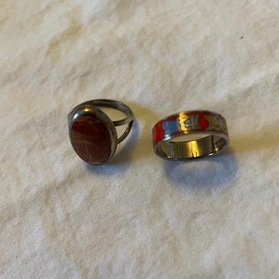 LADIES STERLING RING WITH ORANGE SPINY STONE AND AN ENAMELED BAND