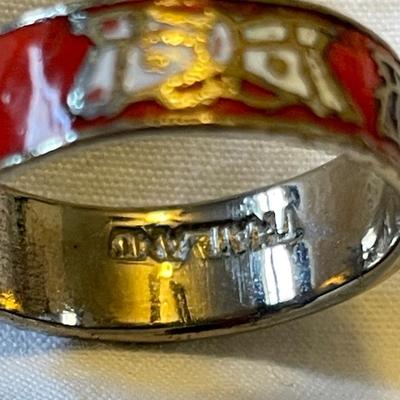 LADIES STERLING RING WITH ORANGE SPINY STONE AND AN ENAMELED BAND