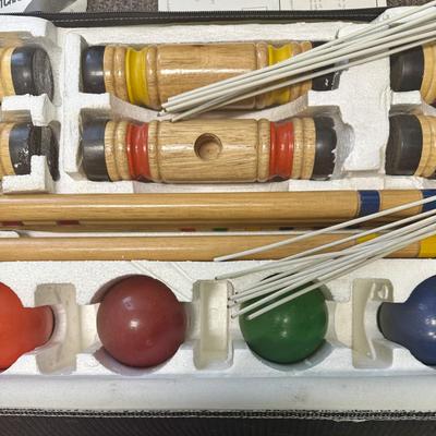 Sale Photo Thumbnail #416: Made by Sportcraft, in near-new condition. 4 mallets, 4 balls, and a set of white wire wickets in a zippered storage case.