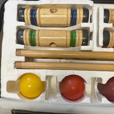 Sale Photo Thumbnail #415: Made by Sportcraft, in near-new condition. 4 mallets, 4 balls, and a set of white wire wickets in a zippered storage case.