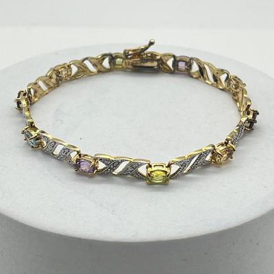 LOT 422: 925 Gold Vermeil and Semi-Precious Gemstone 8" Tennis Bracelet - 8.68 GTW