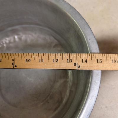 Extra large metal bowl.