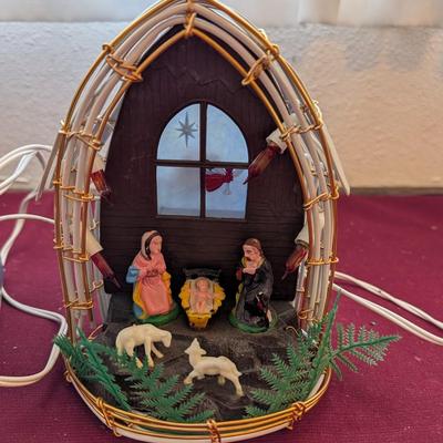 Vintage nativity lamp, two ornaments one with qual etched the other a deer.