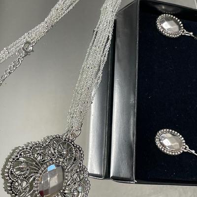 Silver tone necklace and earrings set