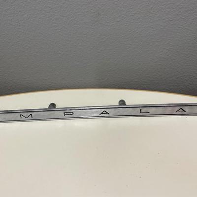 Impala emblem and Chevy cap