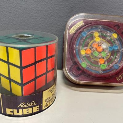 Rubik’s cube and Trillion Puzzle games