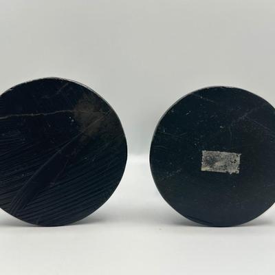 Pair of Carved Black Stone Candlesticks