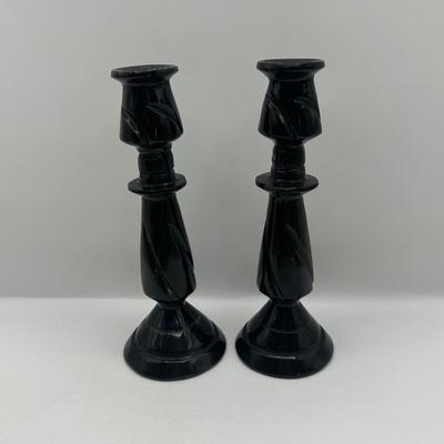 Pair of Carved Black Stone Candlesticks