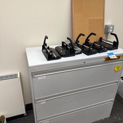 2V4-file cabinet +3 whole punches plus bulletin board