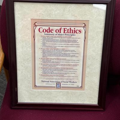 2V6-Office chairs, and coat of ethics wall hanging