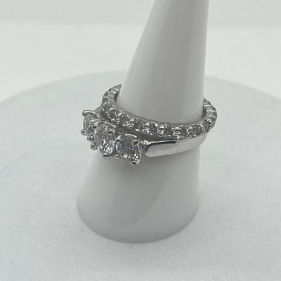LOT 424: Two Sterling Silver Cubic Zirconia Rings - Size 8 and 9 - 6.4 GTW